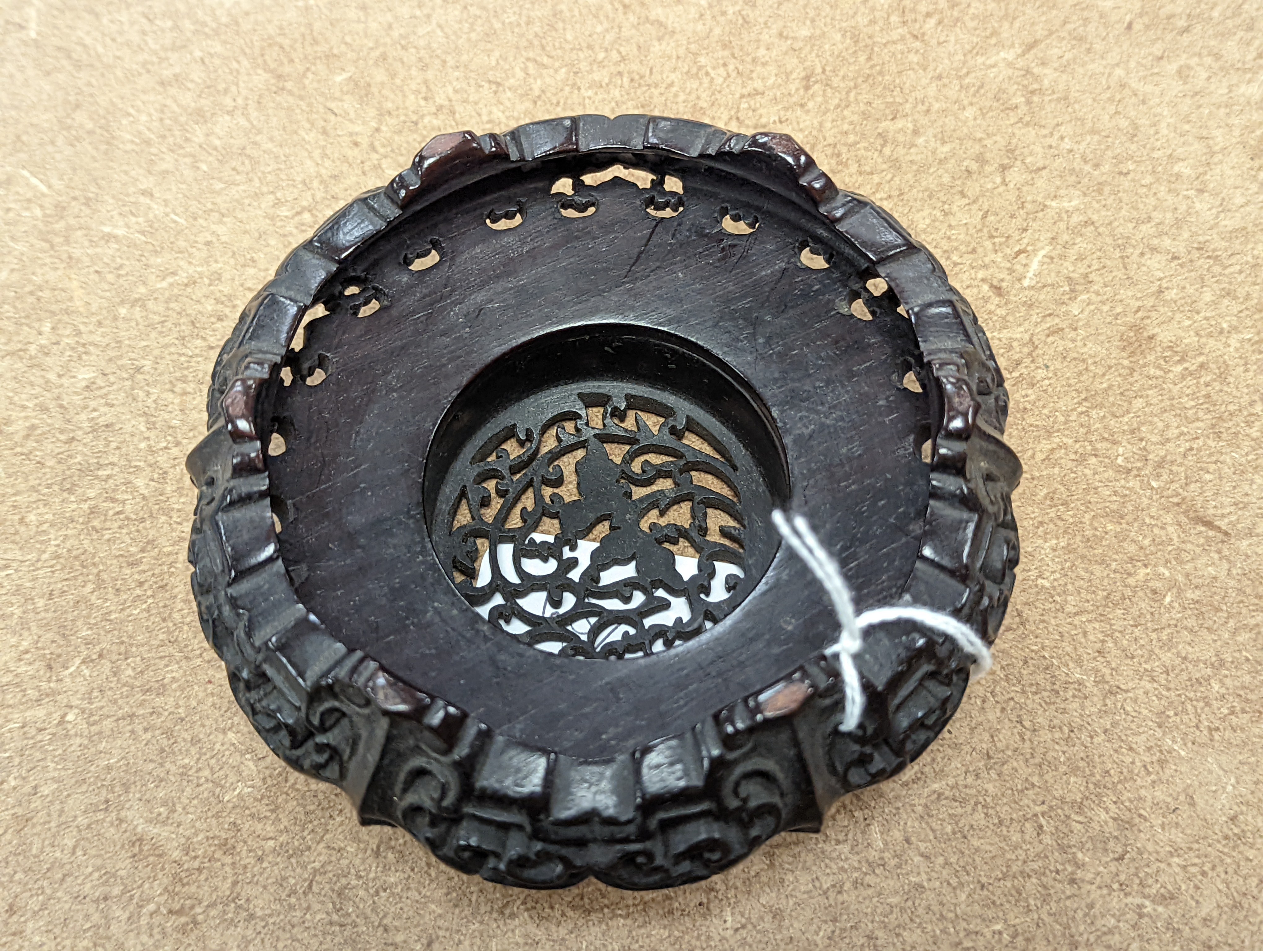 A fine 19th century Chinese hardwood stand, 11.4cm diameter